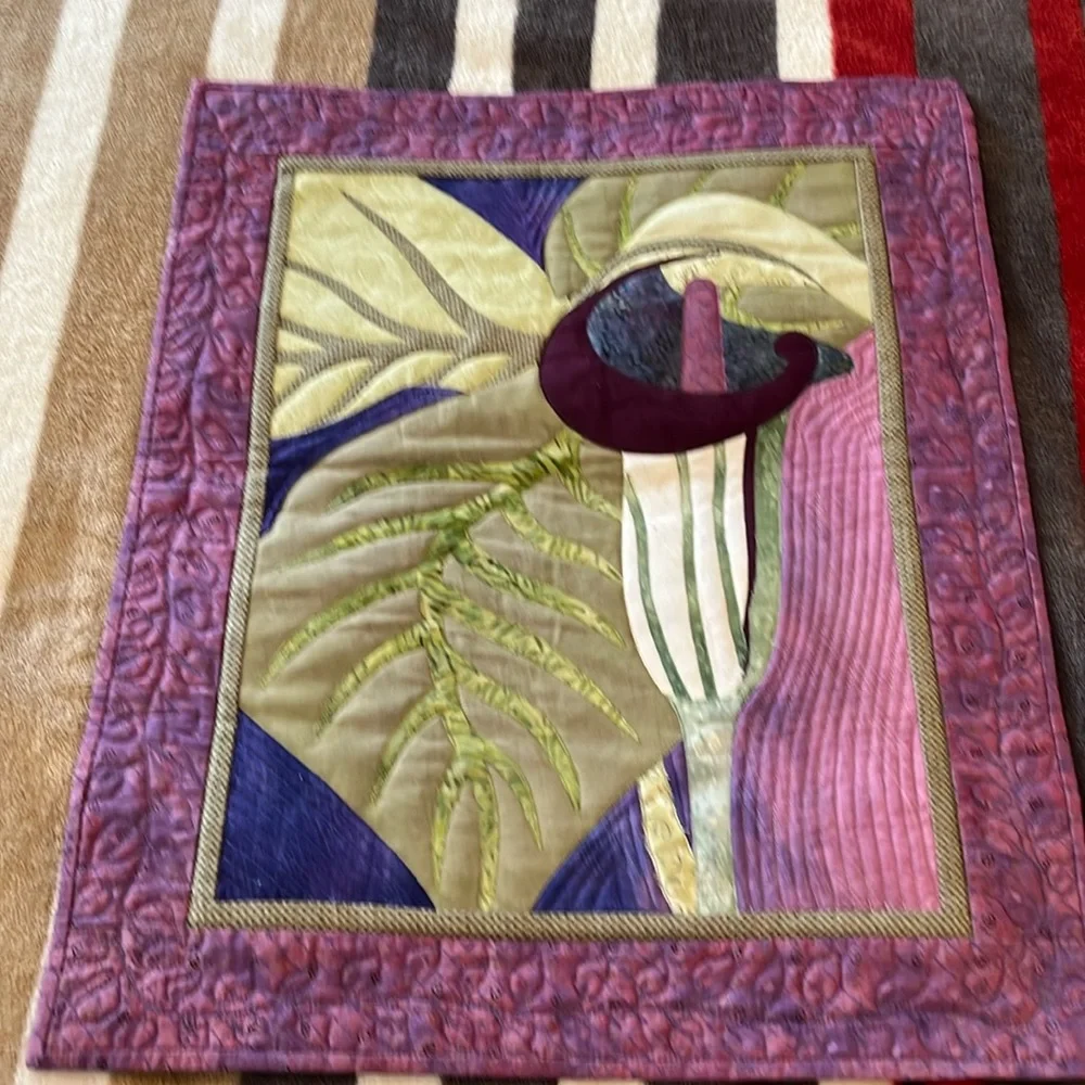 Homemade quilted wall hanging.